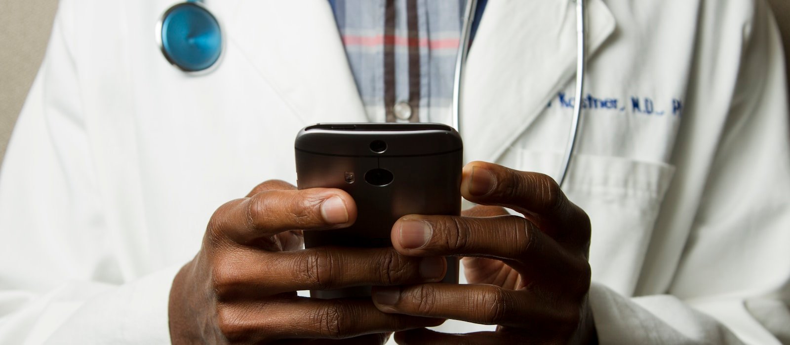 A healthcare professional wearing a stethoscope